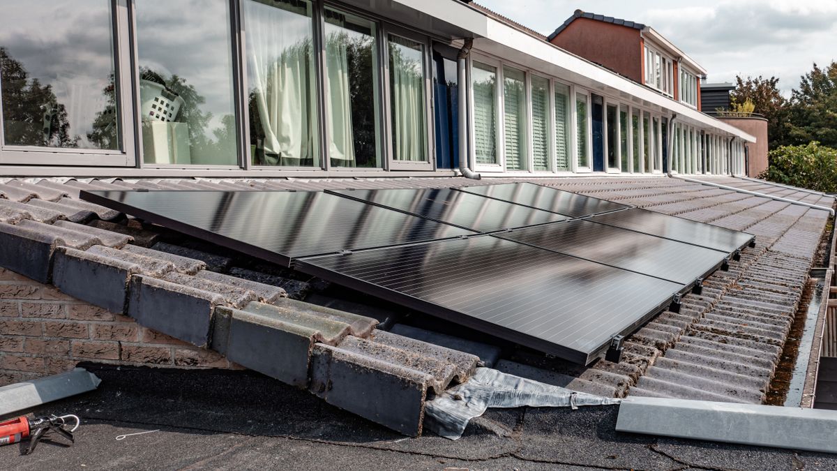 A modern home with rooftop solar panels