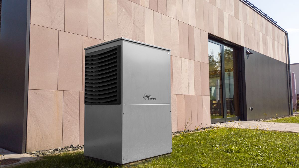 A modern heat pump unit installed outside a building